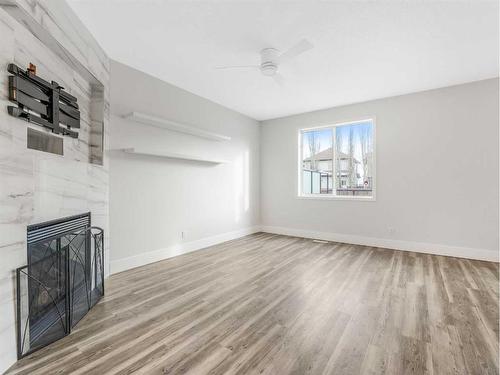 53 Chaparral Ridge Rise Se, Calgary, AB - Indoor With Fireplace