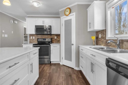 421 Main Street, Champion, AB - Indoor Photo Showing Kitchen With Double Sink