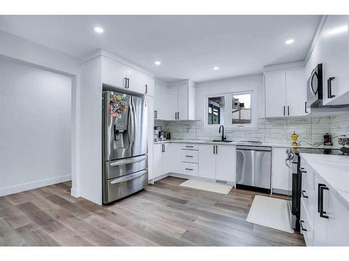 52 Millward Place Ne, Calgary, AB - Indoor Photo Showing Kitchen With Upgraded Kitchen