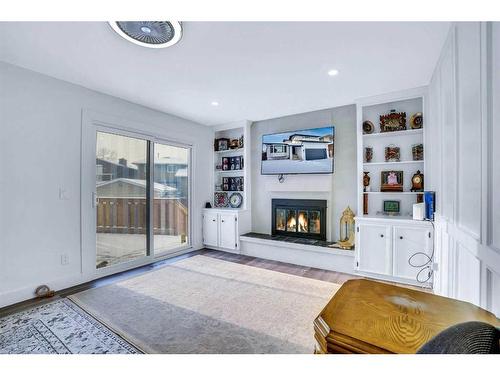 52 Millward Place Ne, Calgary, AB - Indoor Photo Showing Living Room With Fireplace