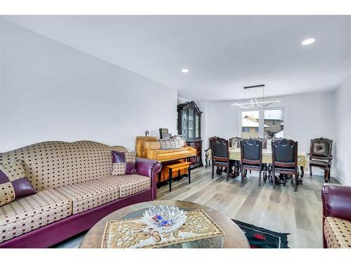 52 Millward Place Ne, Calgary, AB - Indoor Photo Showing Living Room