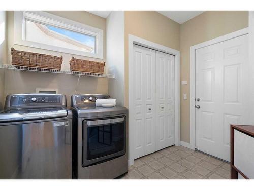 12 Tuscany Glen Place Nw, Calgary, AB - Indoor Photo Showing Laundry Room