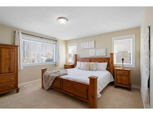 12 Tuscany Glen Place Nw, Calgary, AB - Indoor Photo Showing Bedroom