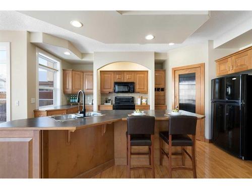 12 Tuscany Glen Place Nw, Calgary, AB - Indoor Photo Showing Kitchen With Double Sink