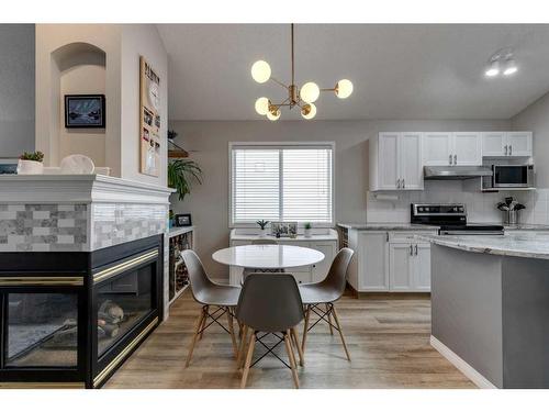 229 Chaparral Villas Se, Calgary, AB - Indoor Photo Showing Other Room With Fireplace