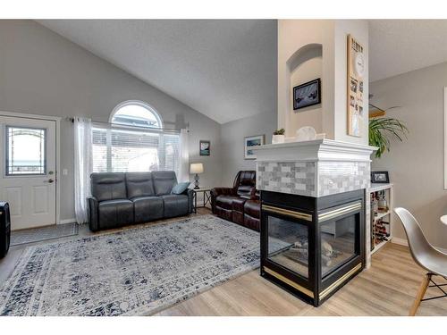 229 Chaparral Villas Se, Calgary, AB - Indoor Photo Showing Living Room With Fireplace