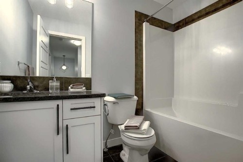 322 Sundown Road, Cochrane, AB - Indoor Photo Showing Bathroom