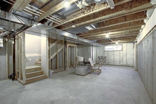322 Sundown Road, Cochrane, AB - Indoor Photo Showing Basement