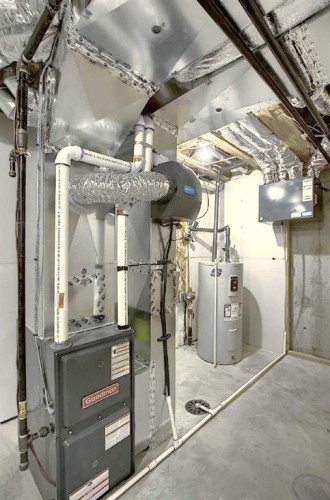 322 Sundown Road, Cochrane, AB - Indoor Photo Showing Basement