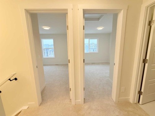 322 Sundown Road, Cochrane, AB - Indoor Photo Showing Other Room