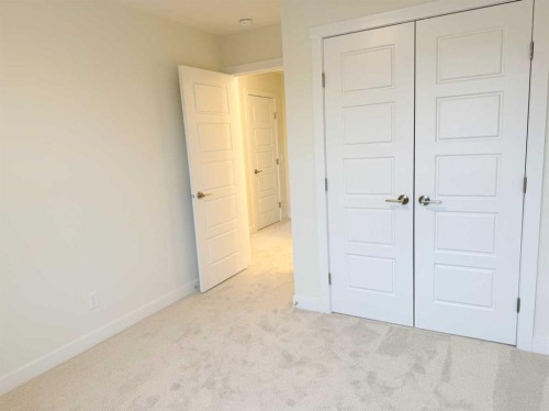 322 Sundown Road, Cochrane, AB - Indoor Photo Showing Other Room