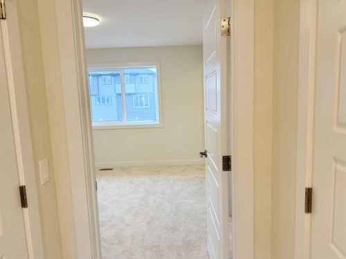 322 Sundown Road, Cochrane, AB - Indoor Photo Showing Other Room