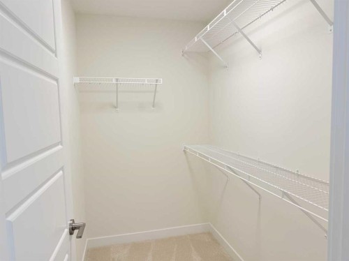 322 Sundown Road, Cochrane, AB - Indoor With Storage