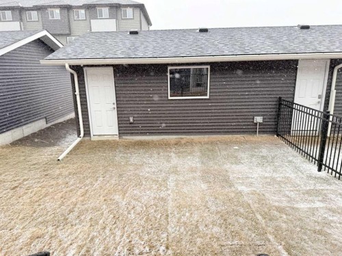 322 Sundown Road, Cochrane, AB - Outdoor With Exterior