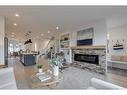 4911 19 Avenue Nw, Calgary, AB  - Indoor Photo Showing Living Room With Fireplace 