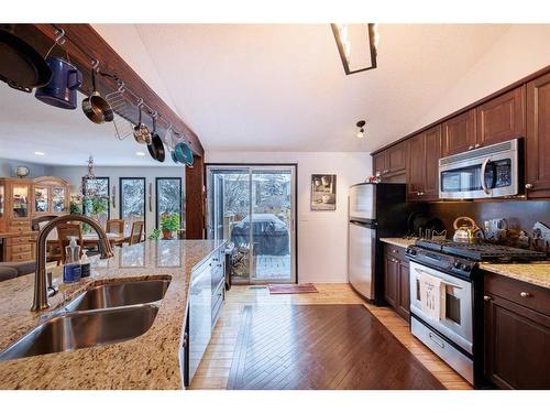 107 Oakfern Way Sw, Calgary, AB - Indoor Photo Showing Kitchen With Double Sink