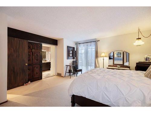 107 Oakfern Way Sw, Calgary, AB - Indoor Photo Showing Bedroom