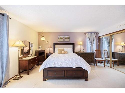 107 Oakfern Way Sw, Calgary, AB - Indoor Photo Showing Bedroom