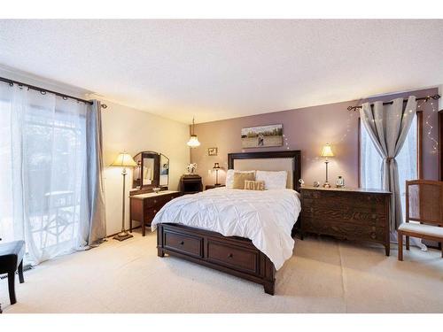 107 Oakfern Way Sw, Calgary, AB - Indoor Photo Showing Bedroom