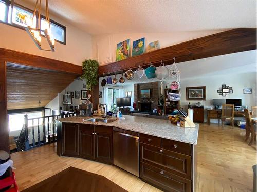 107 Oakfern Way Sw, Calgary, AB - Indoor Photo Showing Kitchen With Double Sink