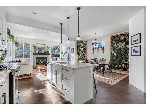 621 15 Avenue Ne, Calgary, AB - Indoor Photo Showing Kitchen With Fireplace With Upgraded Kitchen