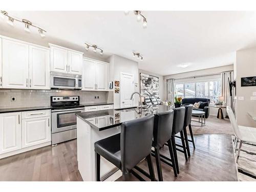 83 Evansborough Common Nw, Calgary, AB - Indoor Photo Showing Kitchen With Upgraded Kitchen