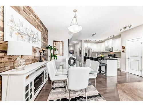 83 Evansborough Common Nw, Calgary, AB - Indoor Photo Showing Dining Room