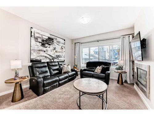 83 Evansborough Common Nw, Calgary, AB - Indoor Photo Showing Living Room