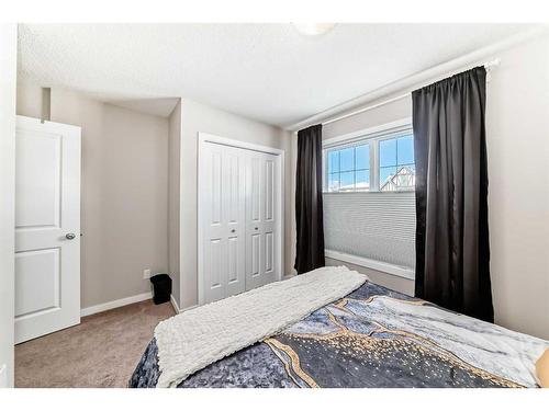 83 Evansborough Common Nw, Calgary, AB - Indoor Photo Showing Bedroom