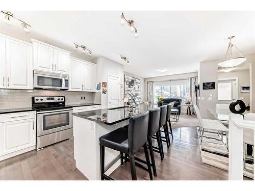 83 Evansborough Common Nw, Calgary, AB - Indoor Photo Showing Kitchen With Upgraded Kitchen