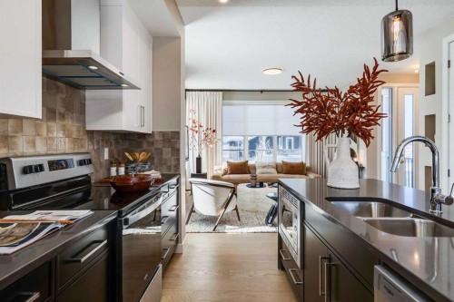 422 River Avenue, Cochrane, AB - Indoor Photo Showing Kitchen With Stainless Steel Kitchen With Double Sink With Upgraded Kitchen