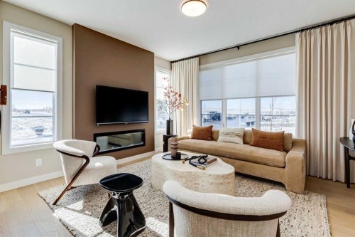422 River Avenue, Cochrane, AB - Indoor Photo Showing Living Room With Fireplace