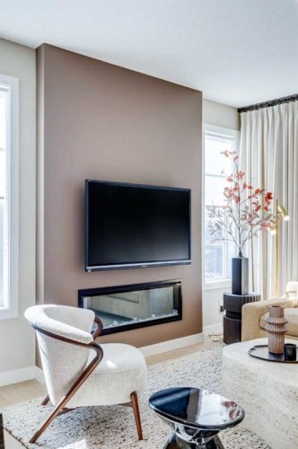 422 River Avenue, Cochrane, AB - Indoor Photo Showing Living Room With Fireplace