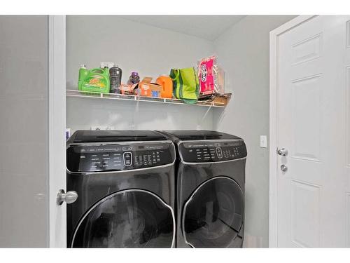 319 Coventry Road Ne, Calgary, AB - Indoor Photo Showing Laundry Room