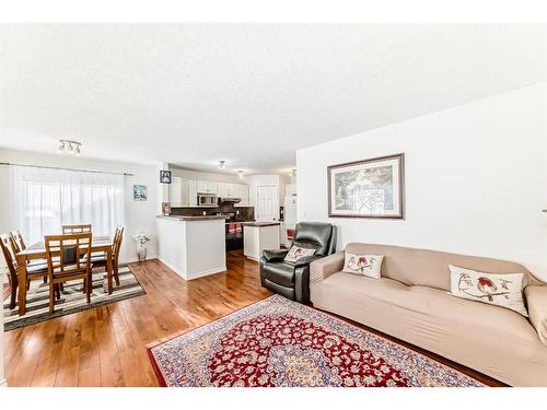 76 Bridleridge Gardens Sw, Calgary, AB - Indoor Photo Showing Living Room