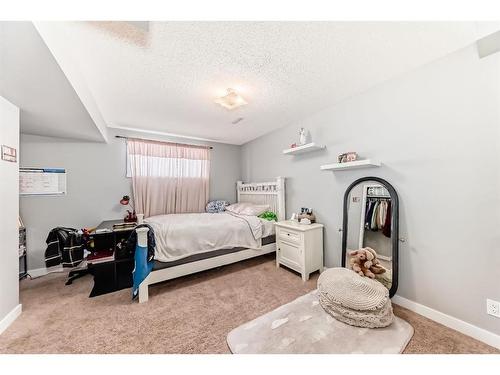 76 Bridleridge Gardens Sw, Calgary, AB - Indoor Photo Showing Bedroom