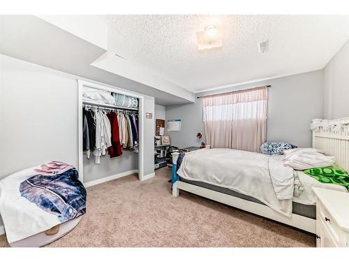 76 Bridleridge Gardens Sw, Calgary, AB - Indoor Photo Showing Bedroom