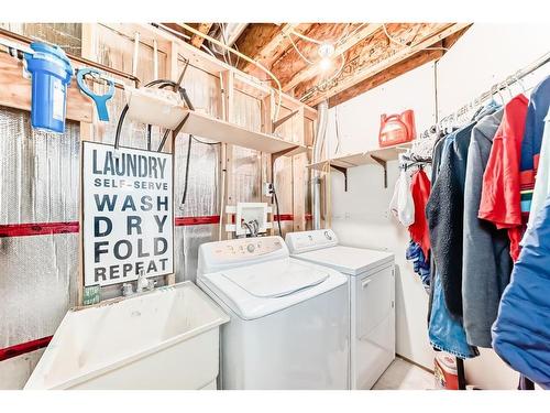 76 Bridleridge Gardens Sw, Calgary, AB - Indoor Photo Showing Laundry Room