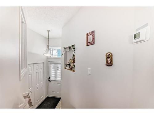 76 Bridleridge Gardens Sw, Calgary, AB - Indoor Photo Showing Other Room