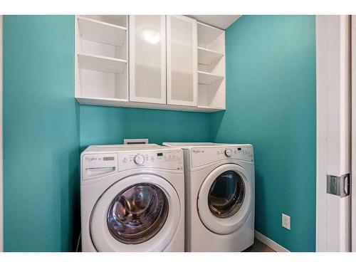 228 Cranarch Crescent Se, Calgary, AB - Indoor Photo Showing Laundry Room