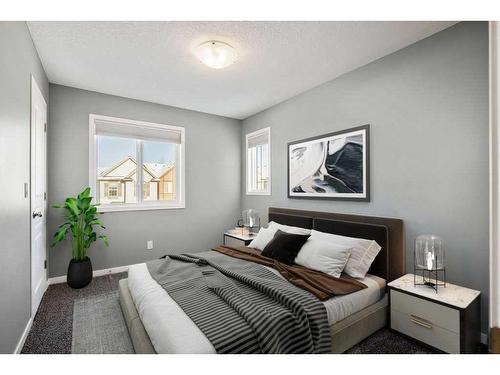 228 Cranarch Crescent Se, Calgary, AB - Indoor Photo Showing Bedroom