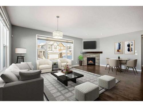 228 Cranarch Crescent Se, Calgary, AB - Indoor Photo Showing Living Room With Fireplace