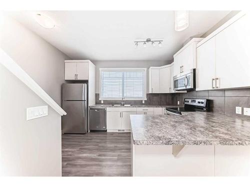 1517 Symons Valley Parkway Nw, Calgary, AB - Indoor Photo Showing Kitchen With Upgraded Kitchen