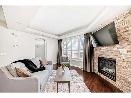 3327 40 Street Sw, Calgary, AB - Indoor Photo Showing Living Room With Fireplace