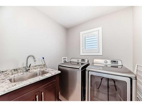 3327 40 Street Sw, Calgary, AB - Indoor Photo Showing Laundry Room