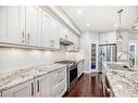 3327 40 Street Sw, Calgary, AB  - Indoor Photo Showing Kitchen With Double Sink With Upgraded Kitchen 