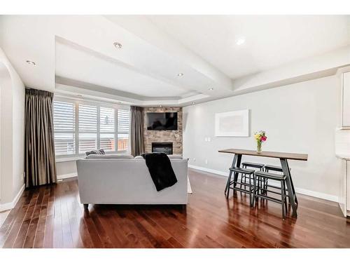 3327 40 Street Sw, Calgary, AB - Indoor Photo Showing Living Room With Fireplace