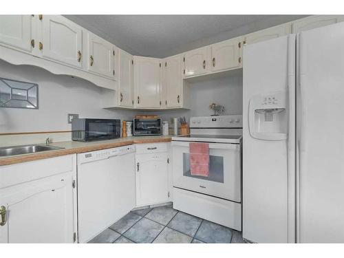 1508 Acadia Drive Se, Calgary, AB - Indoor Photo Showing Kitchen