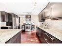 2125 36 Avenue Sw, Calgary, AB  - Indoor Photo Showing Kitchen With Double Sink With Upgraded Kitchen 