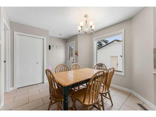 59 Mt Apex Green Se, Calgary, AB - Indoor Photo Showing Dining Room